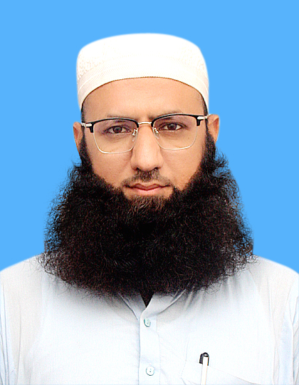 A set of law books, a clock, and a golden balance scale on a desk