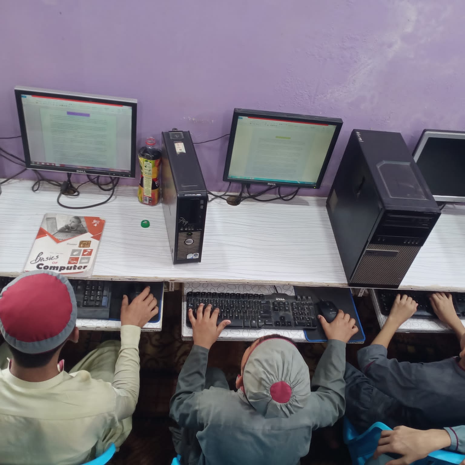 Person sitting in a modern building with a scenic view