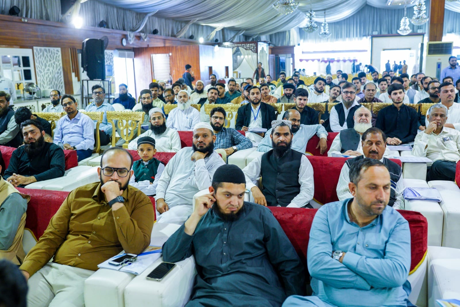 Dog sitting in a yellow kayak