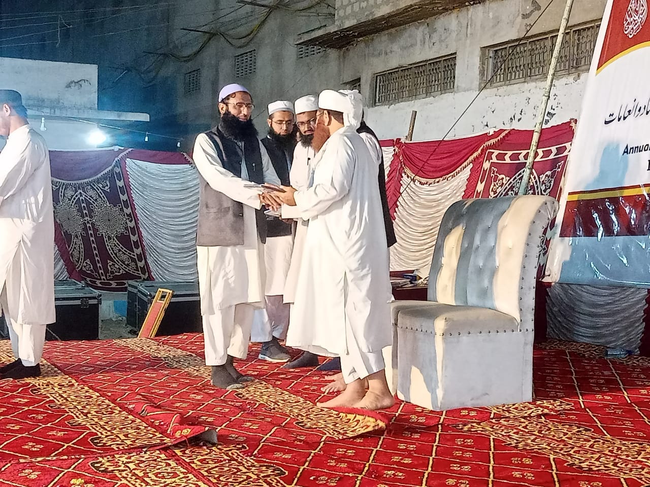 Person holding a green plant