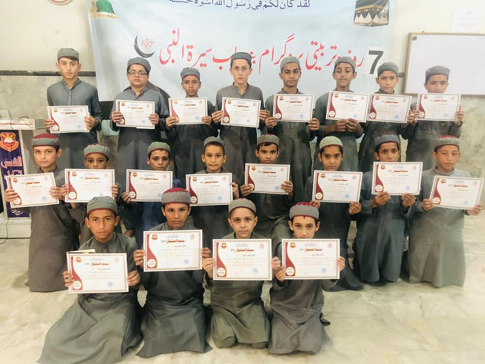 Person holding a green plant